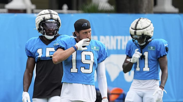 Jul 30, 2024; Charlotte, NC, USA; Carolina Panthers wide receiver Adam Thielen (19), wide receiver Jonathan Mingo (15) and wide receiver Ihmir Smith-Marsette (11) during training camp at Carolina Panthers Practice Fields. Mandatory Credit: Jim Dedmon-Imagn Images Jul 30, 2024; Charlotte, NC, USA; Carolina Panthers wide receiver Adam Thielen (19), wide receiver Jonathan Mingo (15) and wide receiver Ihmir Smith-Marsette (11) during training camp at Carolina Panthers Practice Fields. Mandatory Credit: Jim Dedmon-Imagn Images