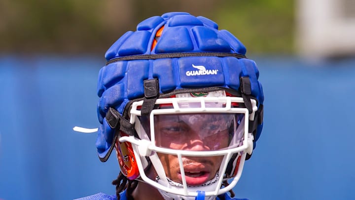 Florida's defensive back DJ Douglas (12) runs through drills during practice.