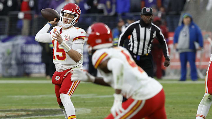Jan 28, 2024; Baltimore, Maryland, USA; Kansas City Chiefs quarterback Patrick Mahomes (15) passes the ball to Chiefs wide receiver Rashee Rice (4) against the Baltimore Ravens in the AFC Championship football game at M&T Bank Stadium. Mandatory Credit: Geoff Burke-Imagn Images