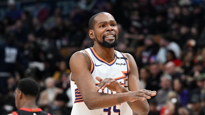 Feb 23, 2025; Toronto, Ontario, CAN;  Phoenix Suns forward Kevin Durant (35) gestures to the referee for a foul call against the Toronto Raptors in the second half at Scotiabank Arena. Mandatory Credit: Dan Hamilton-Imagn Images