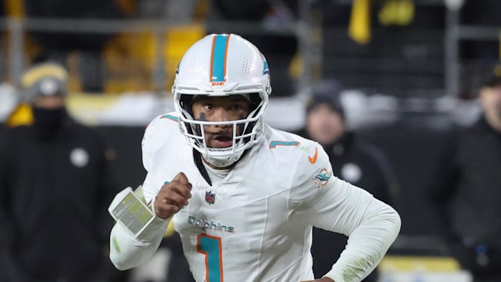 Miami Dolphins quarterback Tua Tagovailoa (1) runs out of the pocket in the fourth quarter against the Pittsburgh Steelers at Acrisure Stadium. Miami Dolphins quarterback Tua Tagovailoa (1) runs out of the pocket in the fourth quarter against the Pittsburgh Steelers at Acrisure Stadium.
