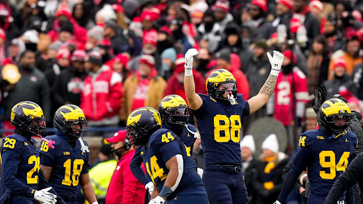 Michigan Wolverines defensive end Lugard Edokpayi (88)n celebrates in the first half of the NCAA football game at Michigan Stadium on Saturday, Nov. 29, 2025 in Ann Arbor, Michigan.