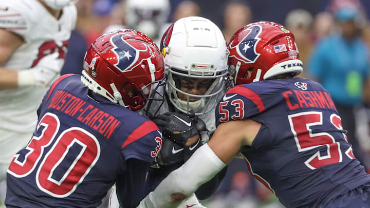 Arizona Cardinals wide receiver Greg Dortch is tackled by Houston Texans safety DeAndre Houston-Carson Arizona Cardinals wide receiver Greg Dortch is tackled by Houston Texans safety DeAndre Houston-Carson