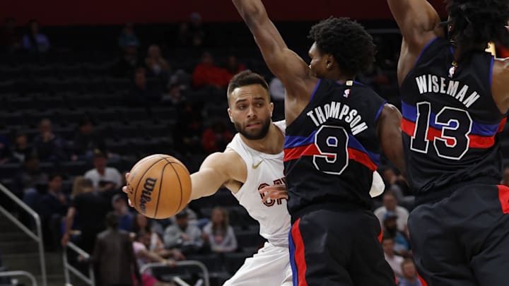 Mar 1, 2024; Detroit, Michigan, USA;  Cleveland Cavaliers guard Max Strus (1) passes on Detroit Pistons forward Ausar Thompson (9) in the second half at Little Caesars Arena. Mandatory Credit: Rick Osentoski-Imagn Images
