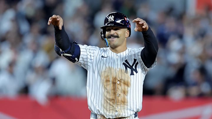Oct 1, 2025; Bronx, New York, USA; New York Yankees center fielder Trent Grisham (12) celebrates his double against the Boston Red Sox during the seventh inning of game two of the Wildcard round of the 2025 MLB playoffs at Yankee Stadium. Mandatory Credit: Brad Penner-Imagn Images