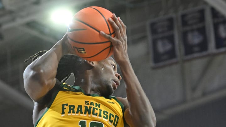 Jan 25, 2024; Spokane, Washington, USA; San Francisco Dons forward Jonathan Mogbo (10) rebounds the ball
against the Gonzaga Bulldogs in the first half at McCarthey Athletic Center. Mandatory Credit: James Snook-USA TODAY Sports Jan 25, 2024; Spokane, Washington, USA; San Francisco Dons forward Jonathan Mogbo (10) rebounds the ball
against the Gonzaga Bulldogs in the first half at McCarthey Athletic Center. Mandatory Credit: James Snook-USA TODAY Sports