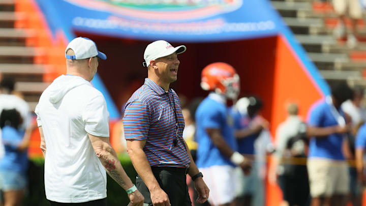 Florida head coach Jon Sumrall enjoys a laugh before the Orange and Blue game at Steve Spurrier Field at Ben Hill Griffin Stadium in Gainesville, FL on Saturday, April 11, 2026. [Alan Youngblood/Gainesville Sun]