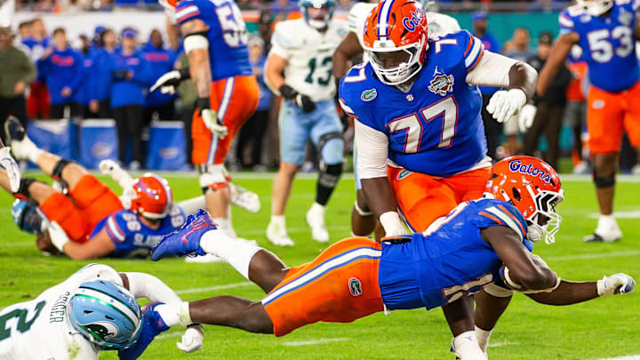 Florida Gators running back Jadan Baugh (13) dives across the goal line for touchdown but it was called back during the second half at Raymond James Stadium in Tampa, FL on Friday, December 20, 2024 in the 2024 Union Home Mortgage Gasparilla Bowl. The Gators defeated Tulane 33-8. [Doug Engle/Gainesville Sun]
