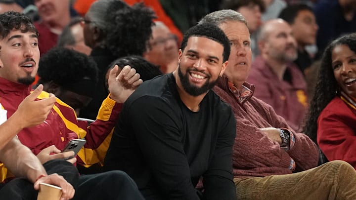 Feb 18, 2026; Los Angeles, California, USA; Chicago Bears quarterback Caleb Williams watches in the second half of the game between the Illinois Fighting Illini and the Southern California Trojans at Galen Center. Mandatory Credit: Kirby Lee-Imagn Images
