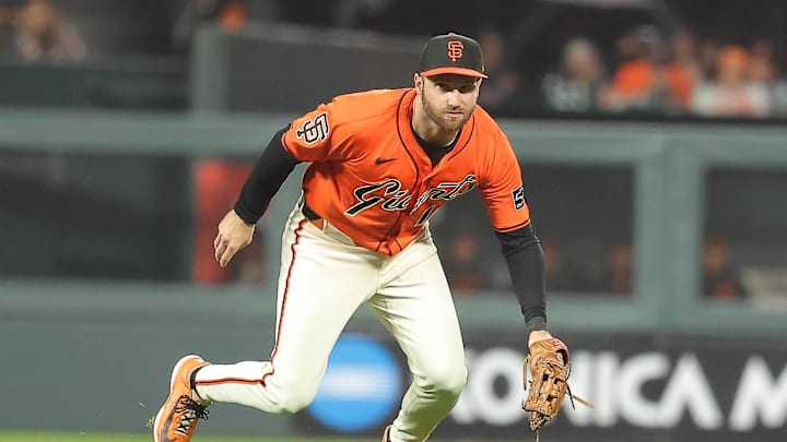 Sep 26, 2025; San Francisco, California, USA; San Francisco Giants second baseman Casey Schmitt (10) is unable to catch the ball against the Colorado Rockies during the fifth inning at Oracle Park. Mandatory Credit: Kelley L Cox-Imagn Images