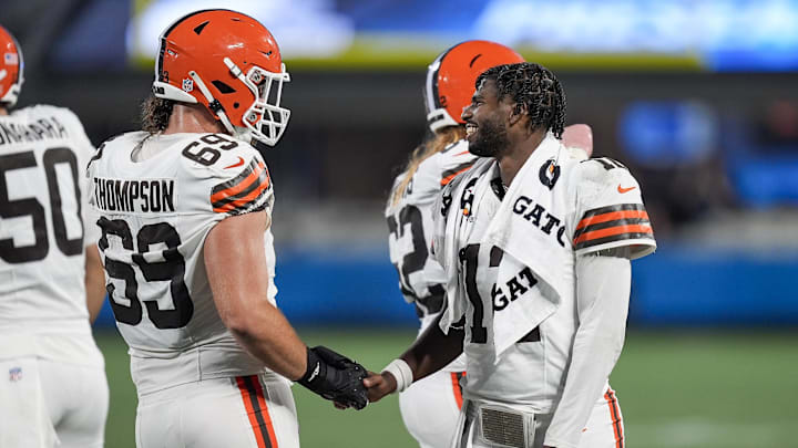 Aug 8, 2025; Charlotte, North Carolina, USA;  Cleveland Browns quarterback Shedeur Sanders (12) greets teammates coming off the field after a touchdown drive against the Carolina Panthers during the second half at Bank of America Stadium. Mandatory Credit: Jim Dedmon-Imagn Images
