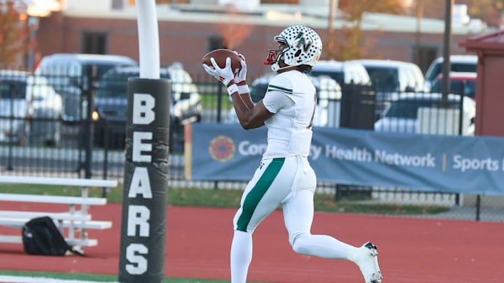 Lawrence North Monshun Sales (1) does some practice pass receptions as Lawrence North took on Lawrence Central in the S6 IHSAA high school football sectional semifinal, Nov 1, 2024; Indianapolis, IN, USA; at Lawrence Central High School.