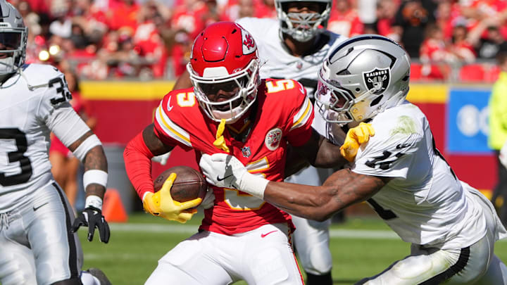 Oct 19, 2025; Kansas City, Missouri, USA; Kansas City Chiefs wide receiver Marquise Brown (5) makes a reception defended by Las Vegas Raiders safety Jeremy Chinn (11) during the third quarter of the game at GEHA Field at Arrowhead Stadium. Mandatory Credit: Denny Medley-Imagn Images Oct 19, 2025; Kansas City, Missouri, USA; Kansas City Chiefs wide receiver Marquise Brown (5) makes a reception defended by Las Vegas Raiders safety Jeremy Chinn (11) during the third quarter of the game at GEHA Field at Arrowhead Stadium. Mandatory Credit: Denny Medley-Imagn Images