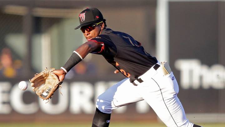 Wisconsin Timber Rattlers' Luis Pena (2) fields a hit against the Quad Cities River Bandits Wednesday, August 27, 2025, at Neuroscience Group Field at Fox Cities Stadium in Grand Chute, Wisconsin. Quad City won 9-5. Wisconsin Timber Rattlers' Luis Pena (2) fields a hit against the Quad Cities River Bandits Wednesday, August 27, 2025, at Neuroscience Group Field at Fox Cities Stadium in Grand Chute, Wisconsin. Quad City won 9-5.