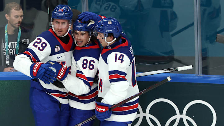 [US, Mexico & Canada customers only] Feb 12, 2026; Milan, Italy; Brock Nelson of United States celebrates scoring their second goal with Jack Hughes of United States and Brock Faber of United States against Latvia  in men's ice hockey group C play during the Milano Cortina 2026 Olympic Winter Games at Milano Santagiulia Ice Hockey Arena. Mandatory Credit: Mike Segar/Reuters via Imagn Images