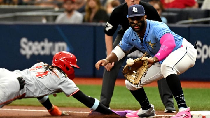 Tampa Bay Rays first baseman Yandy Diaz (right) waits for the ball on a pickoff attempt on Sunday at Tropicana Field. Tampa Bay Rays first baseman Yandy Diaz (right) waits for the ball on a pickoff attempt on Sunday at Tropicana Field.