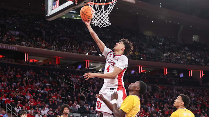 Dec 13, 2025; Queens, New York, USA; St. John's basketball guard Oziyah Sellers (4) drives in the second half against the Iona Gaels at Madison Square Garden. Dec 13, 2025; Queens, New York, USA; St. John's basketball guard Oziyah Sellers (4) drives in the second half against the Iona Gaels at Madison Square Garden.