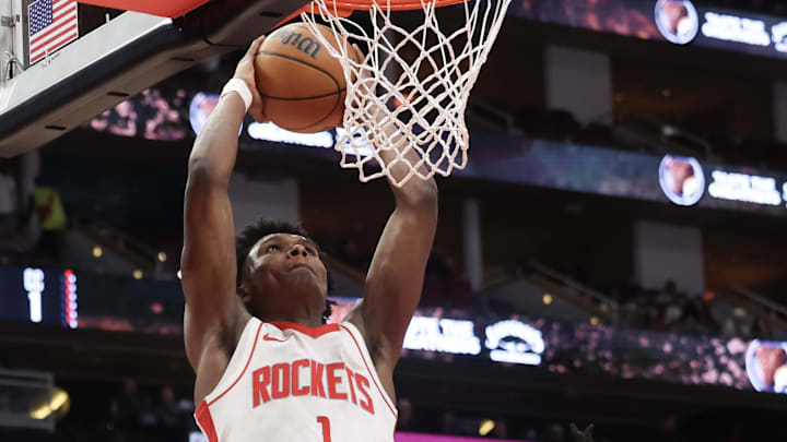 Oct 17, 2024; Houston, Texas, USA; Houston Rockets forward Amen Thompson (1) dunks against San Antonio Spurs guard Stephon Castle (5) in the third quarter at Toyota Center. Mandatory Credit: Thomas Shea-Imagn Images Oct 17, 2024; Houston, Texas, USA; Houston Rockets forward Amen Thompson (1) dunks against San Antonio Spurs guard Stephon Castle (5) in the third quarter at Toyota Center. Mandatory Credit: Thomas Shea-Imagn Images