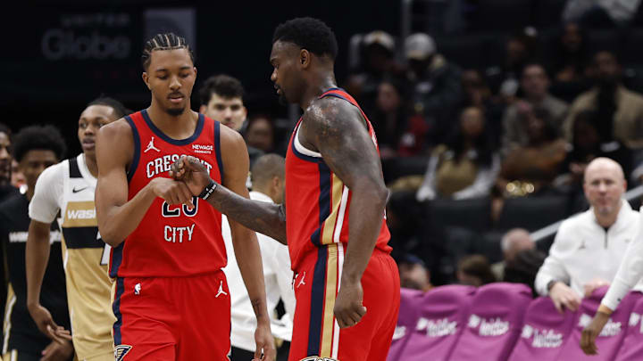 Jan 9, 2026; Washington, District of Columbia, USA; New Orleans Pelicans forward Trey Murphy III (25) celebrates with Pelicans forward Zion Williamson (1) against the Washington Wizards in the second half at Capital One Arena. Mandatory Credit: Geoff Burke-Imagn Images