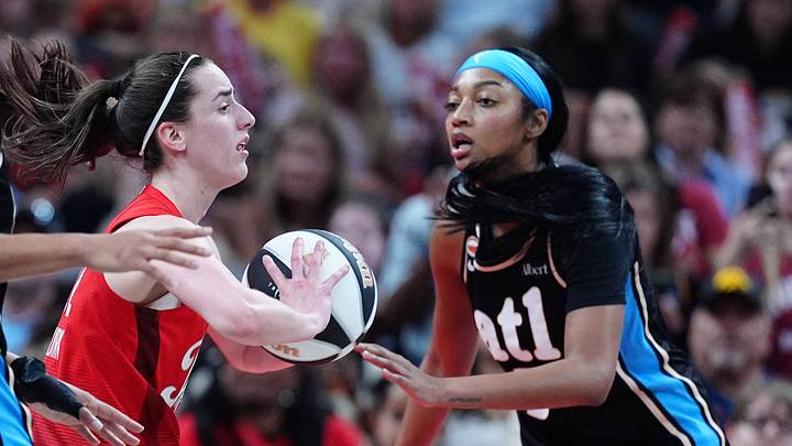 Indiana Fever guard Caitlin Clark is guarded by Atlanta Dream center Angel Reese. Indiana Fever guard Caitlin Clark is guarded by Atlanta Dream center Angel Reese.