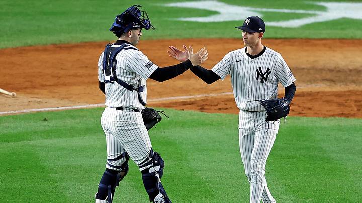 Oct 15, 2024; Bronx, New York, USA; New York Yankees catcher Austin Wells (28) and pitcher Luke Weaver (30) celebrate after defeating the Cleveland Guardians in game two of the ALCS for the 2024 MLB Playoffs at Yankee Stadium. Mandatory Credit: Brad Penner-Imagn Images Oct 15, 2024; Bronx, New York, USA; New York Yankees catcher Austin Wells (28) and pitcher Luke Weaver (30) celebrate after defeating the Cleveland Guardians in game two of the ALCS for the 2024 MLB Playoffs at Yankee Stadium. Mandatory Credit: Brad Penner-Imagn Images