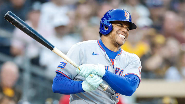 New York Mets right fielder Juan Soto (22) reacts after fouling off a ball off his lower extremity during the fourth inning against the San Diego Padres at Petco Park. 