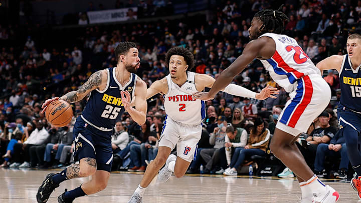 Jan 23, 2022; Denver, Colorado, USA; Denver Nuggets guard Austin Rivers (25) controls the ball under pressure from Detroit Pistons guard Cade Cunningham (2) and center Isaiah Stewart (28) in the first quarter at Ball Arena. Mandatory Credit: Isaiah J. Downing-Imagn Images Jan 23, 2022; Denver, Colorado, USA; Denver Nuggets guard Austin Rivers (25) controls the ball under pressure from Detroit Pistons guard Cade Cunningham (2) and center Isaiah Stewart (28) in the first quarter at Ball Arena. Mandatory Credit: Isaiah J. Downing-Imagn Images