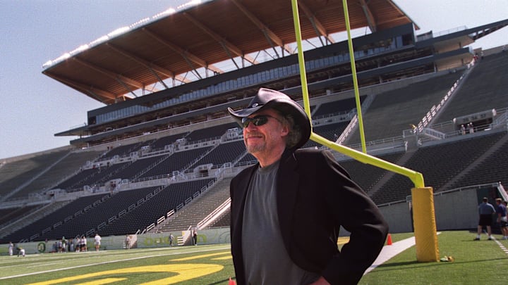 Phil Knight looks around the newly expanded Autzen Stadium during a visit to the last scrimmage before the 2002 season.
