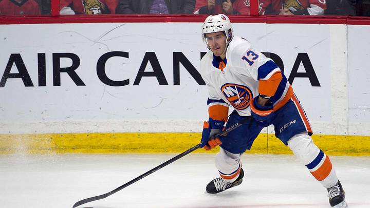 Mar 27, 2018; Ottawa, Ontario, CAN; New York Islanders center Matthew Barzal (13) shoots the puck in the third period against the Ottawa Senators at Canadian Tire Centre. Mandatory Credit: Marc DesRosiers-Imagn Images Mar 27, 2018; Ottawa, Ontario, CAN; New York Islanders center Matthew Barzal (13) shoots the puck in the third period against the Ottawa Senators at Canadian Tire Centre. Mandatory Credit: Marc DesRosiers-Imagn Images
