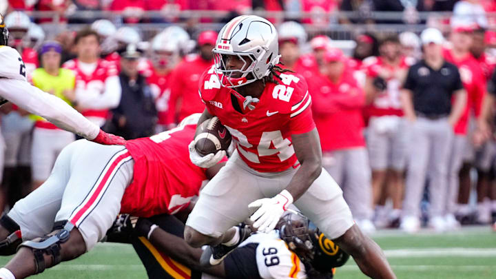 Ohio State Buckeyes running back Sam Dixon (24) runs the ball in the second half of the NCAA football game at the Ohio Stadium on Saturday, Sept. 6, 2025 in Columbus, Ohio.