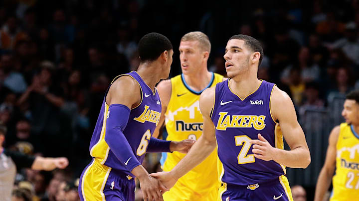 Dec 2, 2017; Denver, CO, USA; Los Angeles Lakers guard Lonzo Ball (2) celebrates with guard Jordan Clarkson (6) after a play in the second quarter against the Denver Nuggets at the Pepsi Center. Mandatory Credit: Isaiah J. Downing-Imagn Images
