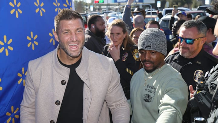 Former University of Florida football player and Heisman Trophy winner Tim Tebow makes a guest appearance on Jan. 28, 2026, at the grand opening for the Walmart Neighborhood Market at 3535 SE Maricamp Road in Ocala.