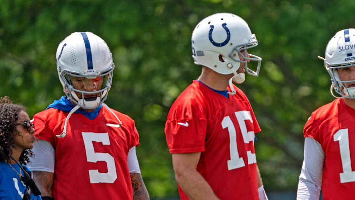 Colts quarterbacks, Anthony Richardson, from left, Joe Flacco and Kedon Slovis wait for the next drill during Indianapolis Colts minicamp practice Tuesday, June 4, 2024 at the Indiana Farm Bureau Football Center.