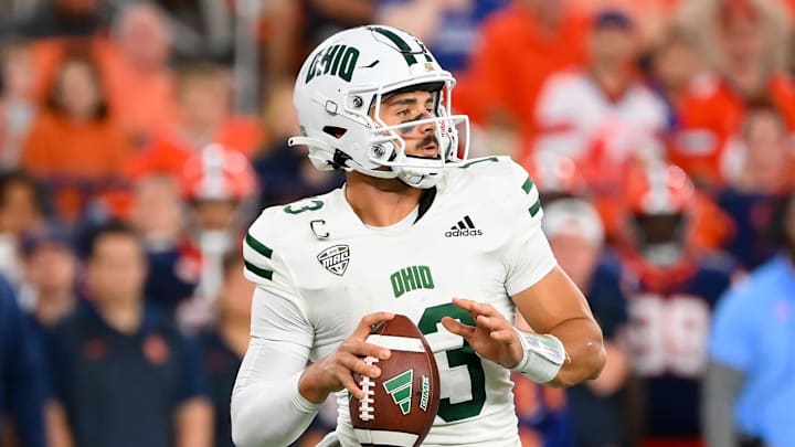 Aug 31, 2024; Syracuse, New York, USA; Ohio Bobcats quarterback Parker Navarro (13) drops back to pass against the Syracuse Orange during the second half at the JMA Wireless Dome. Mandatory Credit: Rich Barnes-Imagn Images
