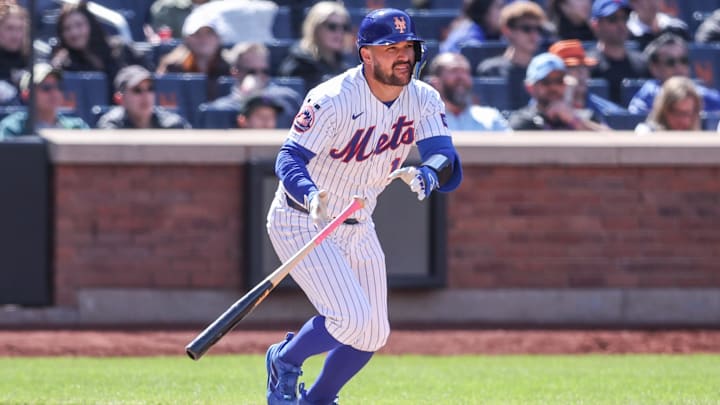Apr 12, 2026; New York City, New York, USA;  New York Mets catcher Luis Torrens (13) hits a single in the sixth inning against the Athletics at Citi Field. Mandatory Credit: Wendell Cruz-Imagn Images