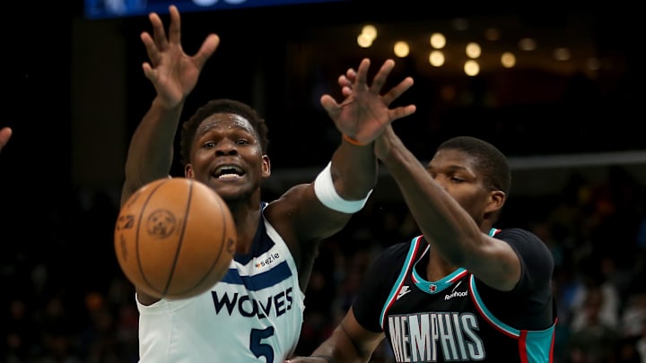 Jan 31, 2026; Memphis, Tennessee, USA; Minnesota Timberwolves guard Anthony Edwards (5) loses control of the ball as Memphis Grizzlies forward Cedric Coward (23) defends during the third quarter at FedExForum. Mandatory Credit: Petre Thomas-Imagn Images Jan 31, 2026; Memphis, Tennessee, USA; Minnesota Timberwolves guard Anthony Edwards (5) loses control of the ball as Memphis Grizzlies forward Cedric Coward (23) defends during the third quarter at FedExForum. Mandatory Credit: Petre Thomas-Imagn Images