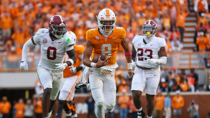 Oct 19, 2024; Knoxville, Tennessee, USA; Tennessee Volunteers quarterback Nico Iamaleava (8) runs the ball against the Alabama Crimson Tide during the second half at Neyland Stadium. Mandatory Credit: Randy Sartin-Imagn Images Oct 19, 2024; Knoxville, Tennessee, USA; Tennessee Volunteers quarterback Nico Iamaleava (8) runs the ball against the Alabama Crimson Tide during the second half at Neyland Stadium. Mandatory Credit: Randy Sartin-Imagn Images