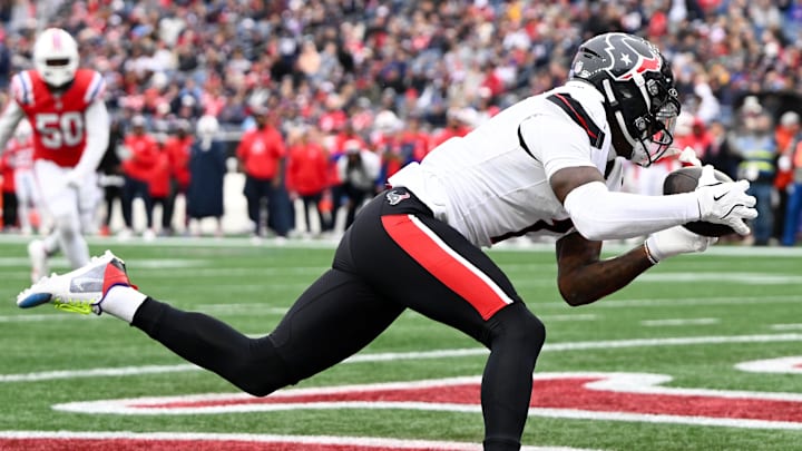 Texans wide receiver Stefon Diggs (1) makes a catch for a touchdown against the New England Patriots during the second half at Gillette Stadium. Texans wide receiver Stefon Diggs (1) makes a catch for a touchdown against the New England Patriots during the second half at Gillette Stadium.
