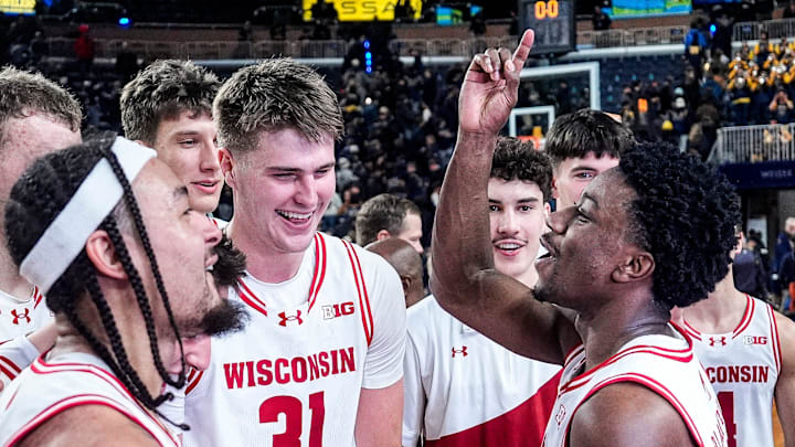 Wisconsin guard John Blackwell (25), center right, celebrates 91-88 win over Michigan at Crisler Center in Ann Arbor on Saturday, Jan. 10, 2026.