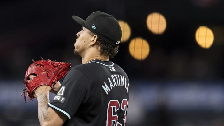 Sep 3, 2024; San Francisco, California, USA; Arizona Diamondbacks pitcher Justin Martinez (63) prepares to pitch against the Arizona Diamondbacks during the eighth inning at Oracle Park. Mandatory Credit: John Hefti-Imagn Images Sep 3, 2024; San Francisco, California, USA; Arizona Diamondbacks pitcher Justin Martinez (63) prepares to pitch against the Arizona Diamondbacks during the eighth inning at Oracle Park. Mandatory Credit: John Hefti-Imagn Images