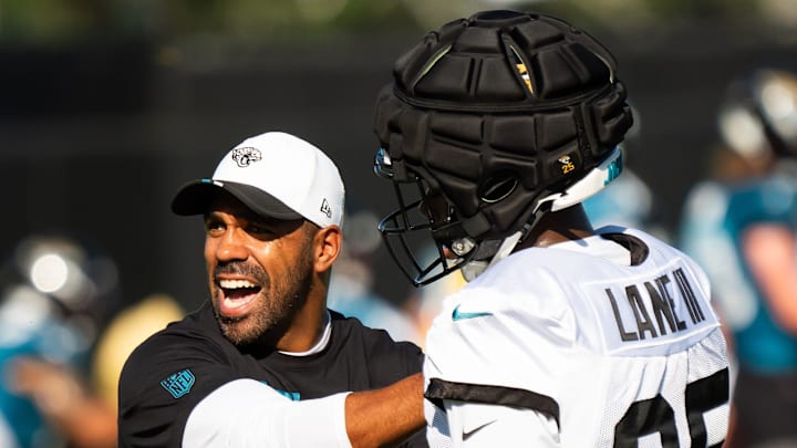Defensive Backs Coach Anthony Perkins teaches a moment using Jacksonville Jaguars safety Rayuan Lane III (25) during an NFL training camp fourth session at the Miller Electric Center, Sunday, July 27, 2025, in Jacksonville, Fla. [Doug Engle/Florida Times-Union]