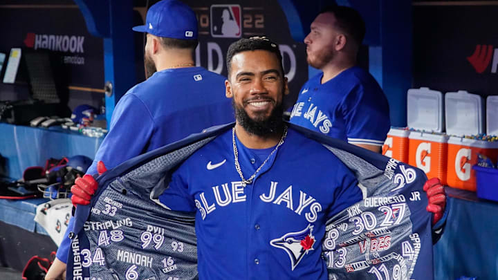 Toronto Blue Jays right fielder Teoscar Hernandez (37) celebrates in the dugout after hitting a solo home run in the fourth inning against the Seattle Mariners during game two of the Wild Card series for the 2022 MLB Playoffs at Rogers Centre on Oct 8. Toronto Blue Jays right fielder Teoscar Hernandez (37) celebrates in the dugout after hitting a solo home run in the fourth inning against the Seattle Mariners during game two of the Wild Card series for the 2022 MLB Playoffs at Rogers Centre on Oct 8.