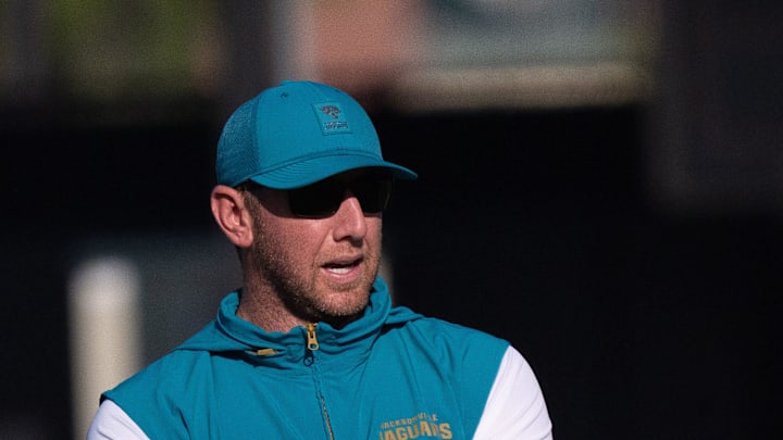 Jacksonville Jaguars Head Coach Liam Coen, left, talks with Assistant Strength and Conditioning Coach Julian Whitehead during the Jacksonville Jaguars’ 18th and final training camp practice at Miller Electric Center in Jacksonville, Fla. Wednesday August 20, 2025. [Doug Engle/Florida Times-Union]