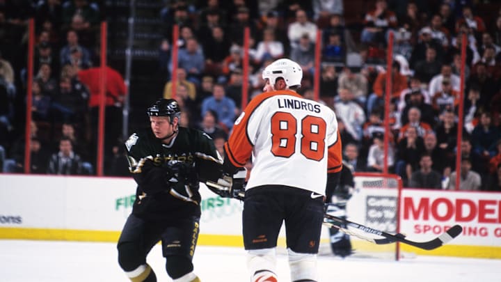 Mar 14, 1999; Philadelphia, PA, USA; FILE PHOTO; Dallas Stars center Tony Hrkac (41) in action against Philadelphia Flyers center Eric Lindros (88) at the First Union Center. Mandatory Credit: Lou Capozzola-USA TODAY NETWORK