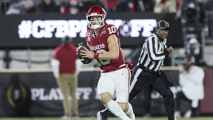 Oklahoma Sooners quarterback John Mateer looks to throw a pass in the first half against the Alabama Crimson Tide at Gaylord Family OK Memorial Stadium. Oklahoma Sooners quarterback John Mateer looks to throw a pass in the first half against the Alabama Crimson Tide at Gaylord Family OK Memorial Stadium.