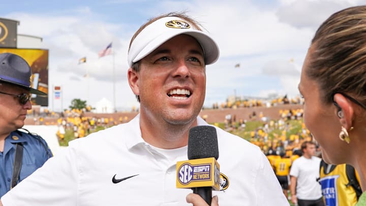 Sep 14, 2024; Columbia, Missouri, USA; Missouri Tigers head coach Eli Drinkwitz speaks to a reporter after the win over the Boston College Eagles at Faurot Field at Memorial Stadium. Mandatory Credit: Denny Medley-Imagn Images