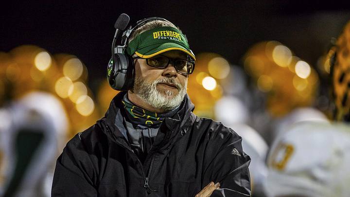 Henry Clay head football coach Phillip Hawkins, shown while coaching at Bryan Station, has been placed on administrative leave after being charged with first-degree distribution of obscene matter to minors. Hawkins has denied the allegations.