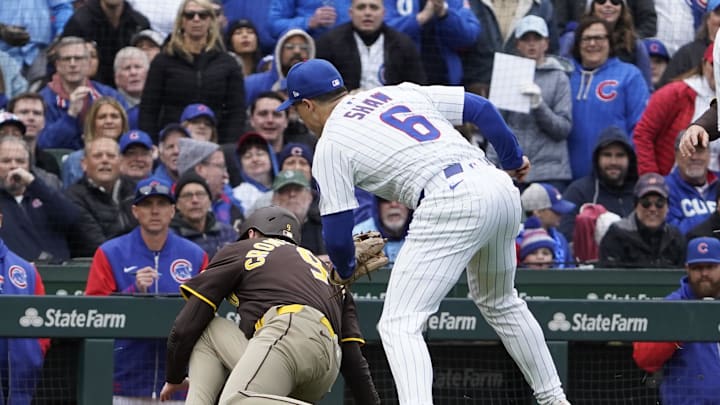 Chicago Cubs third baseman Matt Shaw (6) tags out San Diego Padres first baseman Jake Cronenworth (9) at third base during the fifth inning at Wrigley Field on April 4.