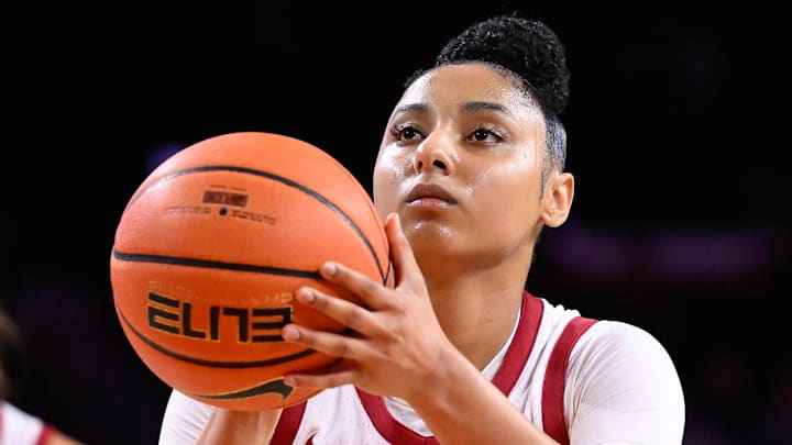 Feb 8, 2025; Los Angeles, California, USA;  USC Trojans guard JuJu Watkins (12) shoots a free throw during the third quarter against the Ohio State Buckeyes at Galen Center. Mandatory Credit: Robert Hanashiro-Imagn Images