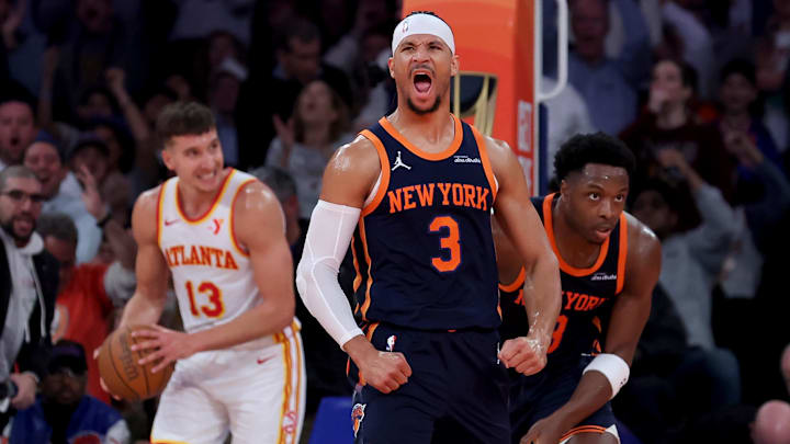 Dec 11, 2024; New York, New York, USA; New York Knicks guard Josh Hart (3) reacts after a dunk by forward OG Anunoby (8) against Atlanta Hawks guard Bogdan Bogdanovic (13) during the second quarter at Madison Square Garden. Mandatory Credit: Brad Penner-Imagn Images Dec 11, 2024; New York, New York, USA; New York Knicks guard Josh Hart (3) reacts after a dunk by forward OG Anunoby (8) against Atlanta Hawks guard Bogdan Bogdanovic (13) during the second quarter at Madison Square Garden. Mandatory Credit: Brad Penner-Imagn Images